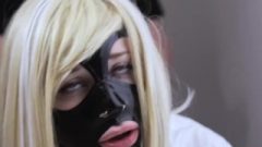 Fair-haired In Latex Mask Spanked And Whipped